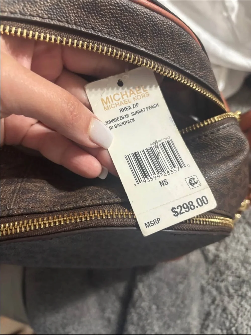 Michael Kors Brown Monogram with Coral Trim Backpack